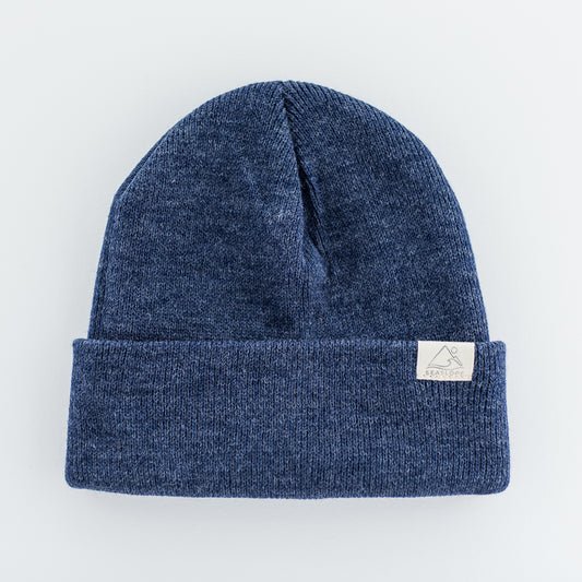 Introducing the DUSK YOUTH/ADULT BEANIE by seaslope1: This blue knit beanie features a folded cuff and is made from 100% acrylic in the USA. Its striking appearance stands out against a plain white background.